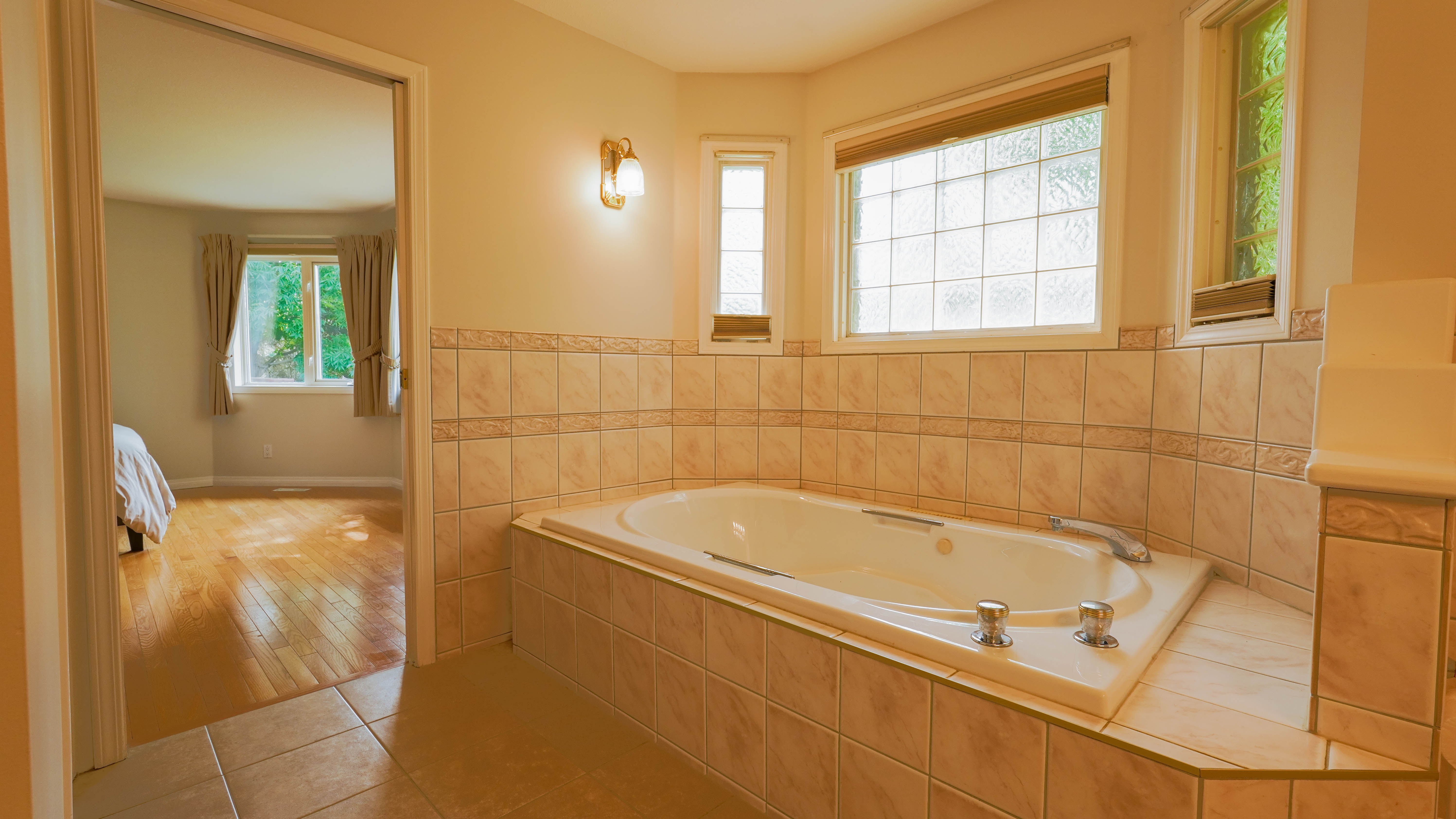 Primary ensuite with jetted Jacuzzi tub